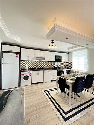 شقة واسعة غرفتين وصالة مفروشة - ضمن مجمع سكني في محمودلار/ الانيا 