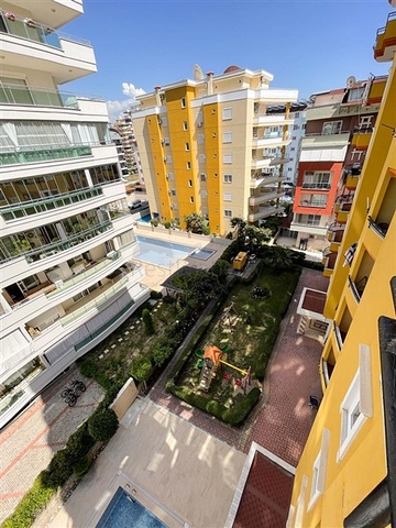 شقة واسعة غرفتين وصالة مفروشة - ضمن مجمع سكني في محمودلار/ الانيا 