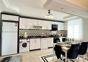 شقة واسعة غرفتين وصالة مفروشة - ضمن مجمع سكني في محمودلار/ الانيا 