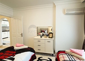 شقة واسعة غرفتين وصالة مفروشة - ضمن مجمع سكني في محمودلار/ الانيا 