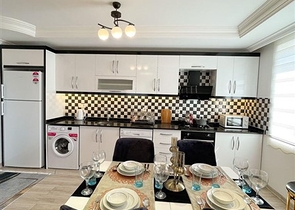 شقة واسعة غرفتين وصالة مفروشة - ضمن مجمع سكني في محمودلار/ الانيا 