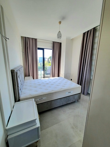 شقة جديدة  - غرفة وصالة مفروشة -ضمن مجمع - في محمودلار / الانيا 