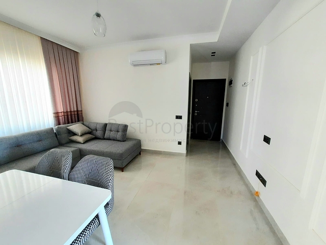 شقة جديدة  - غرفة وصالة مفروشة -ضمن مجمع - في محمودلار / الانيا 