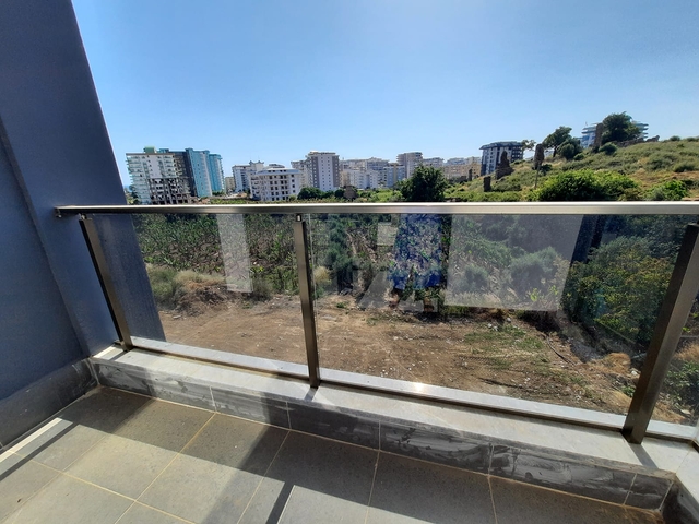 شقة جديدة  - غرفة وصالة مفروشة -ضمن مجمع - في محمودلار / الانيا 