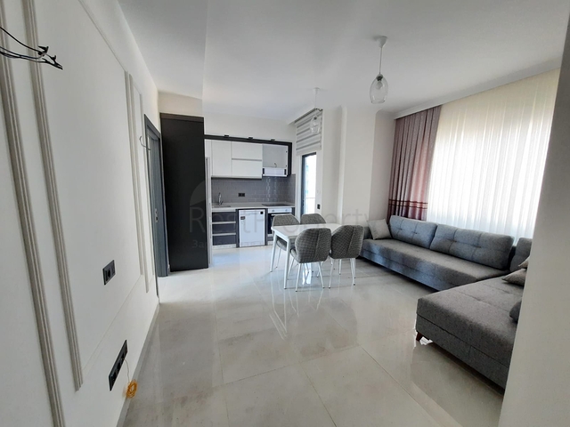 شقة جديدة  - غرفة وصالة مفروشة -ضمن مجمع - في محمودلار / الانيا 