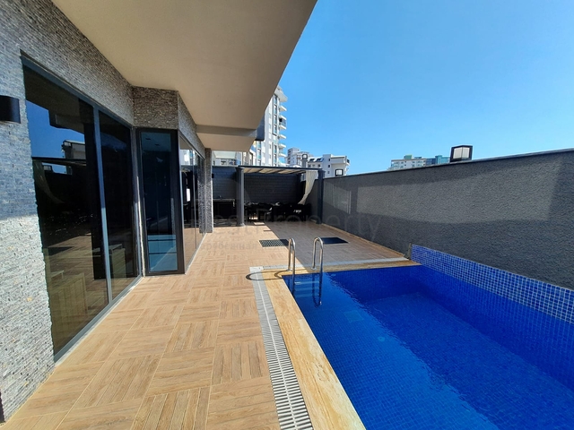 شقة جديدة  - غرفة وصالة مفروشة -ضمن مجمع - في محمودلار / الانيا 