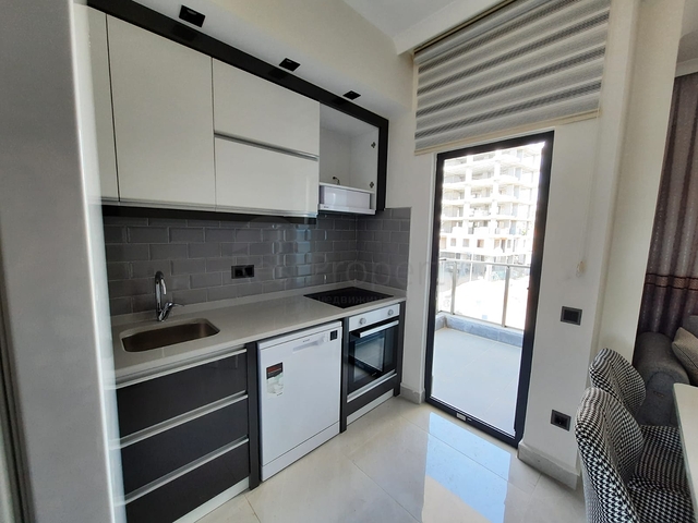 شقة جديدة  - غرفة وصالة مفروشة -ضمن مجمع - في محمودلار / الانيا 