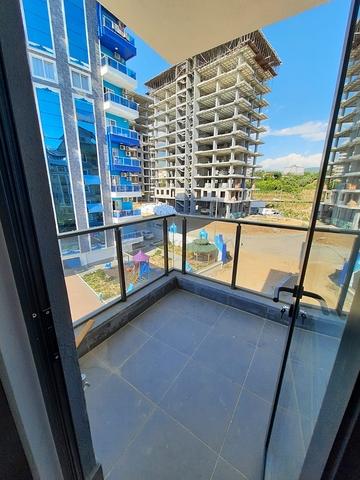 شقة جديدة  - غرفة وصالة مفروشة -ضمن مجمع - في محمودلار / الانيا 