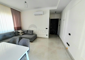 شقة جديدة  - غرفة وصالة مفروشة -ضمن مجمع - في محمودلار / الانيا 