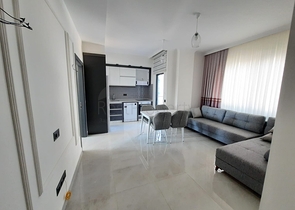 شقة جديدة  - غرفة وصالة مفروشة -ضمن مجمع - في محمودلار / الانيا 