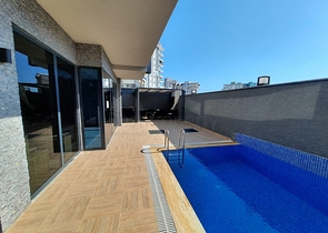 شقة جديدة  - غرفة وصالة مفروشة -ضمن مجمع - في محمودلار / الانيا 