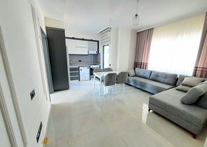 شقة جديدة  - غرفة وصالة مفروشة -ضمن مجمع - في محمودلار / الانيا 