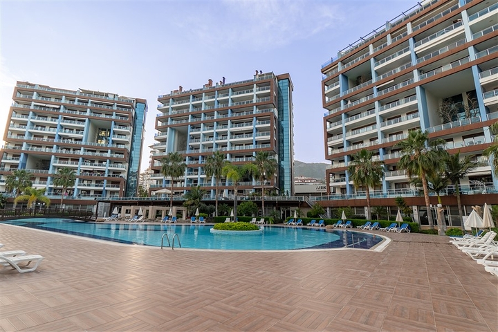 خلف مول الانيوم - شقة غرفة وصالة مفروشة - مجمع فاخر - في جيكجلي / الانيا 