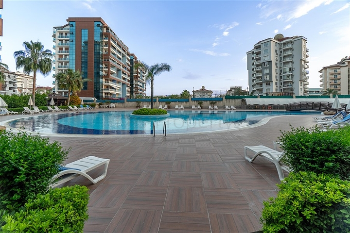 خلف مول الانيوم - شقة غرفة وصالة مفروشة - مجمع فاخر - في جيكجلي / الانيا 