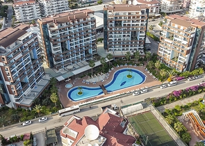 خلف مول الانيوم - شقة غرفة وصالة مفروشة - مجمع فاخر - في جيكجلي / الانيا 