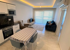 ضمن مجمع فاخر - قريب من البحر - شقة غرفة وصالة مفروشة - في مهوتلار / الانيا 