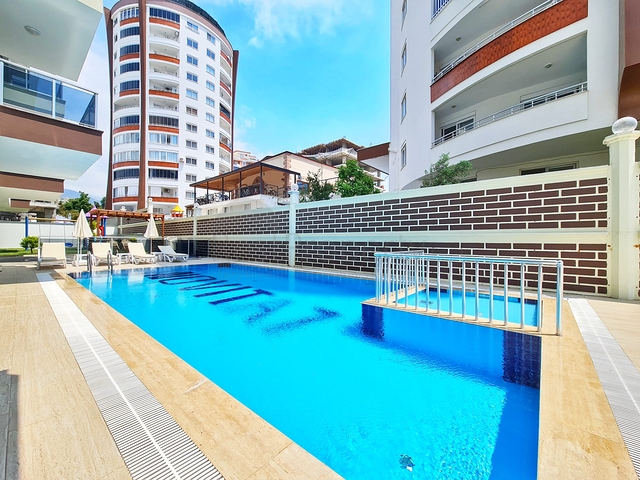 شقة غرفة وصالة - ضمن مجمع سكني جديد - في محمودلار / الانيا 