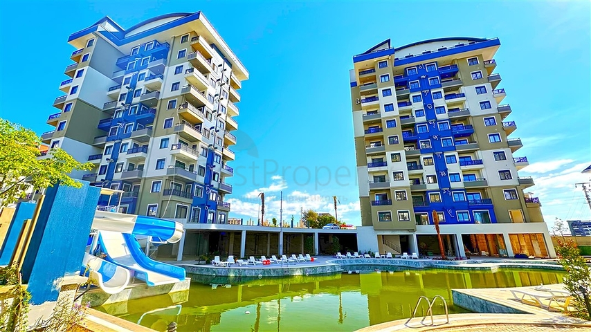 شقة جديدة بغرفة نوم واحدة في مجمع مع بنية تحتية ممتازة