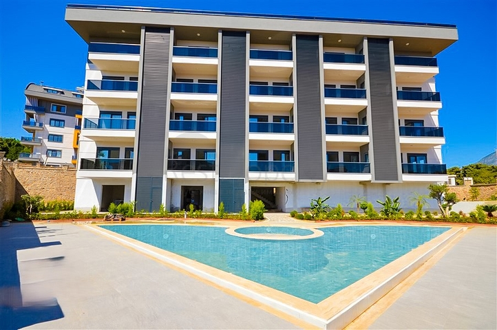 شقة 1+1 في أوبا في مجمع قيد الإنشاء 