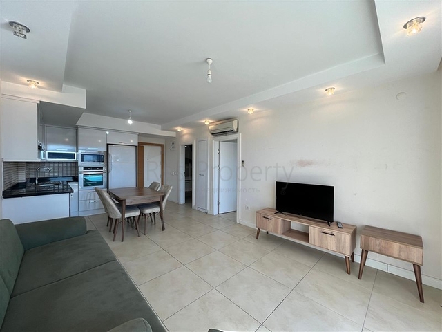 شقة 1+1 في المنطقة الوسطى من ألانيا-سيكجيلي