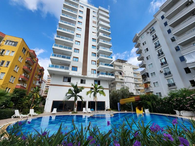 شقة غرفة وصالة - مفروشة - ضمن مجمع انيق - مهموتلار / الانيا 