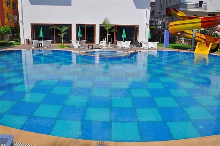 شقة غرفة وصالة - مفروشة - ضمن مجمع انيق - مهموتلار / الانيا 