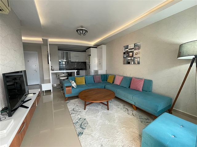 شقة غرفة وصالة - مفروشة - ضمن مجمع انيق - مهموتلار / الانيا 