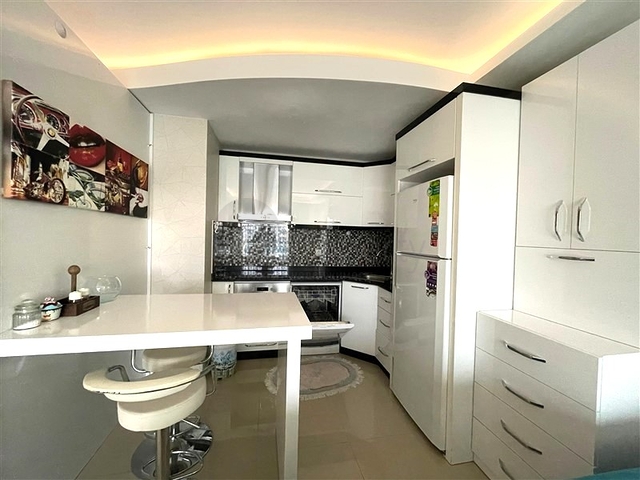 شقة غرفة وصالة - مفروشة - ضمن مجمع انيق - مهموتلار / الانيا 