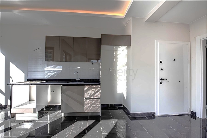 شقة 1+1 في مجمع سكني جديد في منطقة محمودلار بسعر منافس 