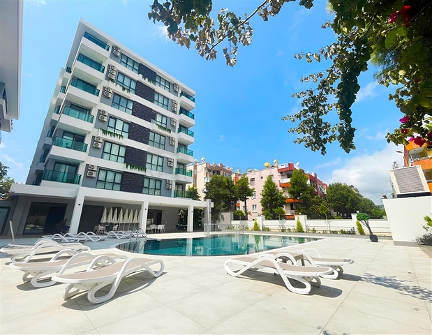 شقة حديثة 1 + 1 في مجمع مع بنية تحتية للفنادق-على بعد 250 متر فقط من شاطئ كليوباترا