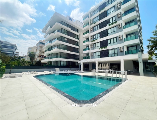 شقة حديثة 1 + 1 في مجمع مع بنية تحتية للفنادق-على بعد 250 متر فقط من شاطئ كليوباترا