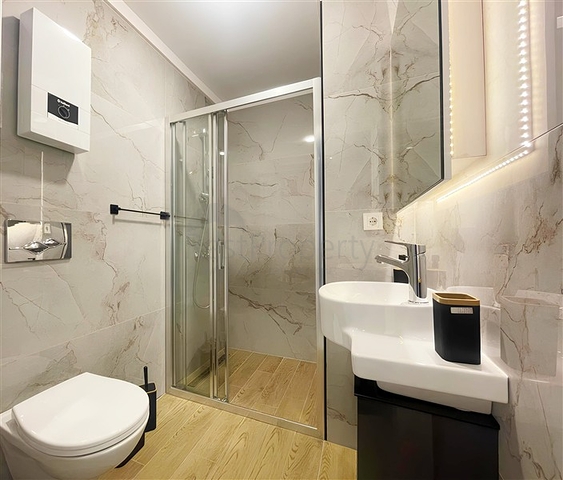 شقة حديثة 1 + 1 في مجمع مع بنية تحتية للفنادق-على بعد 250 متر فقط من شاطئ كليوباترا