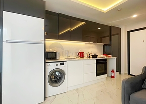 شقة حديثة 1 + 1 في مجمع مع بنية تحتية للفنادق-على بعد 250 متر فقط من شاطئ كليوباترا