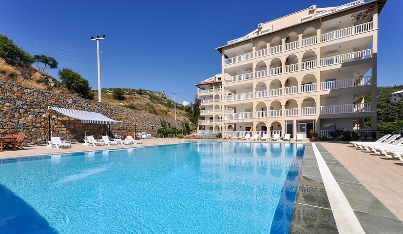 شقة فسيحة 2 + 1 مطلة على البحر في منطقة هادئة في ألانيا 