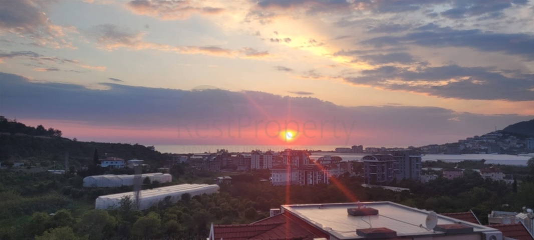 شقة فسيحة 2 + 1 مطلة على البحر في منطقة هادئة في ألانيا 