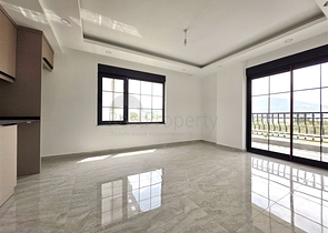 شقة مريحة 1 + 1 في مجمع جديد مطل على البحر