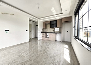 شقة مريحة 1 + 1 في مجمع جديد مطل على البحر