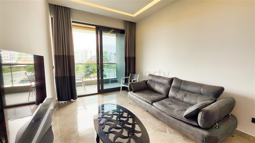 شقة 1+1 على البحر في منطقة كارجيجاك الخلابة هي عرض مثالي للعيش والاسترخاء