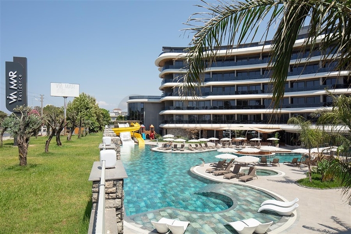 شقة 1+1 على البحر في منطقة كارجيجاك الخلابة هي عرض مثالي للعيش والاسترخاء