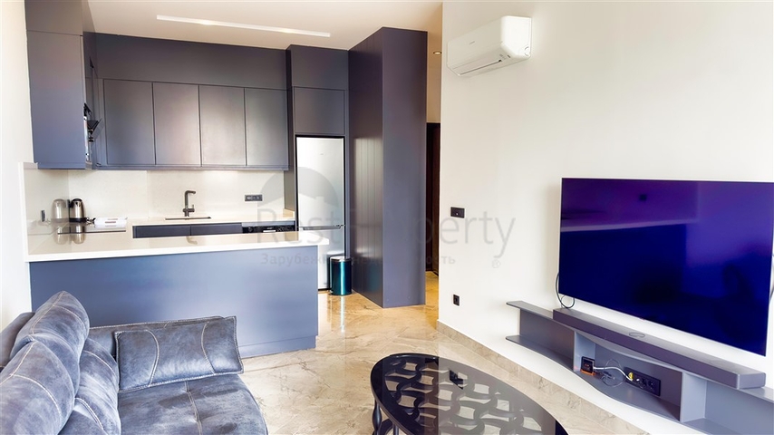 شقة 1+1 على البحر في منطقة كارجيجاك الخلابة هي عرض مثالي للعيش والاسترخاء