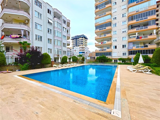  الراحة والراحة في كل متر: استئجار شقة 2 + 1 عن طريق البحر