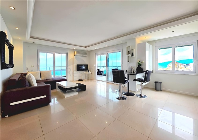  الراحة والراحة في كل متر: استئجار شقة 2 + 1 عن طريق البحر