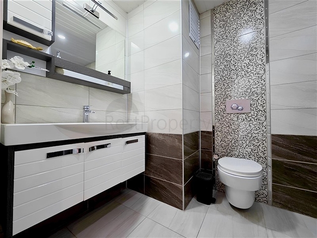  الراحة والراحة في كل متر: استئجار شقة 2 + 1 عن طريق البحر