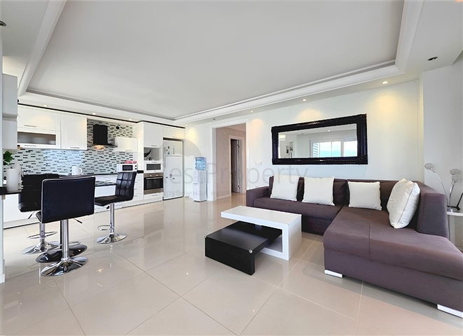  الراحة والراحة في كل متر: استئجار شقة 2 + 1 عن طريق البحر