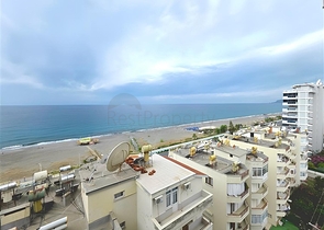  الراحة والراحة في كل متر: استئجار شقة 2 + 1 عن طريق البحر