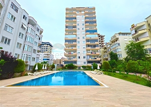  الراحة والراحة في كل متر: استئجار شقة 2 + 1 عن طريق البحر