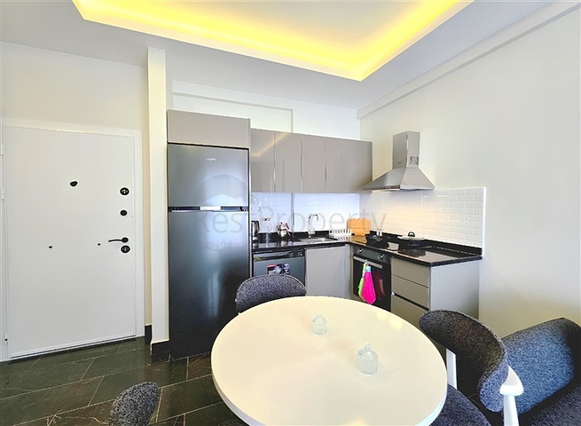 شقة حديثة 1 + 1 للإيجار-الراحة والبنية التحتية في وسط محمودلار