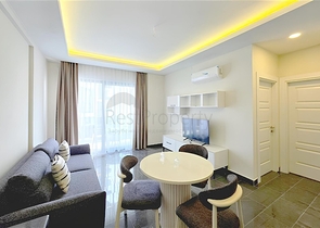 شقة حديثة 1 + 1 للإيجار-الراحة والبنية التحتية في وسط محمودلار