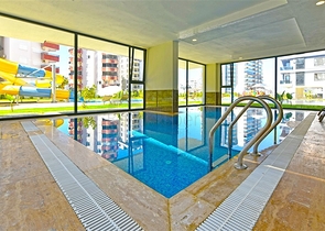 شقة حديثة 1 + 1 للإيجار-الراحة والبنية التحتية في وسط محمودلار