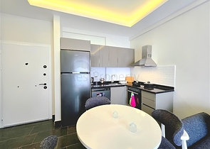 شقة حديثة 1 + 1 للإيجار-الراحة والبنية التحتية في وسط محمودلار